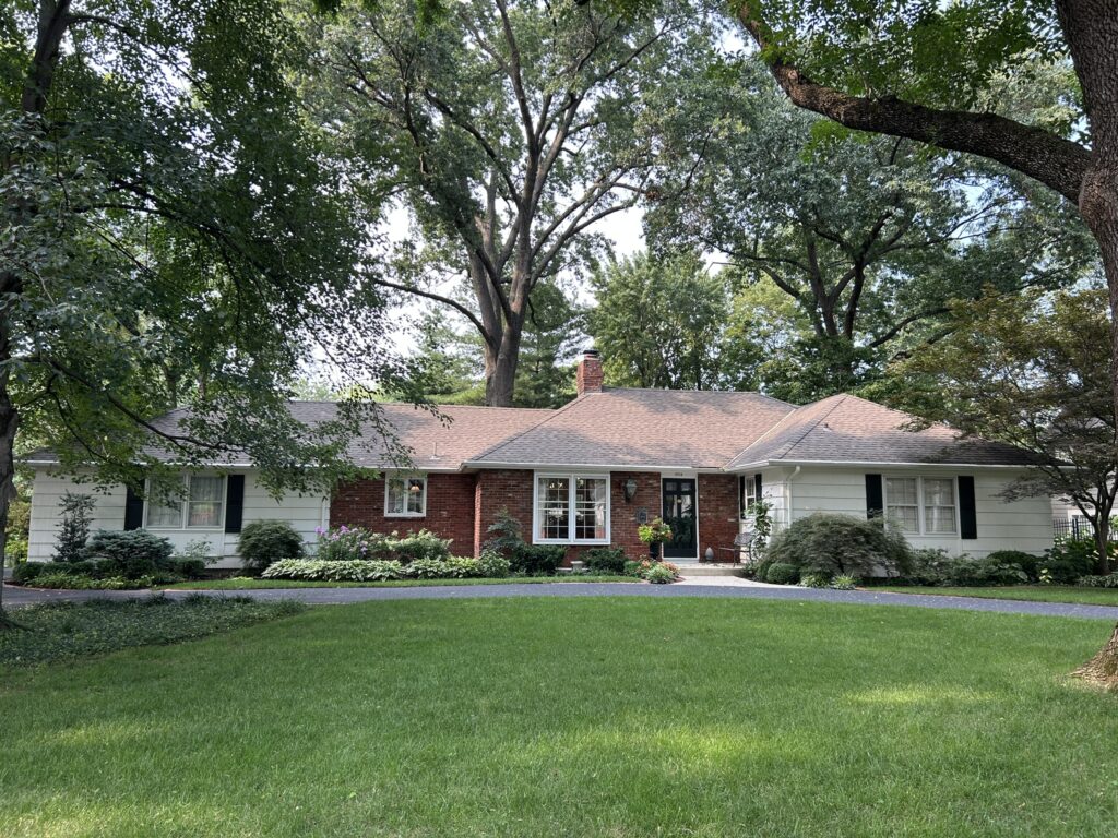 Estate sale hosted by Brown Button estate sales in leawood kansas featuring furniture, decor, kitchenware, and appliances